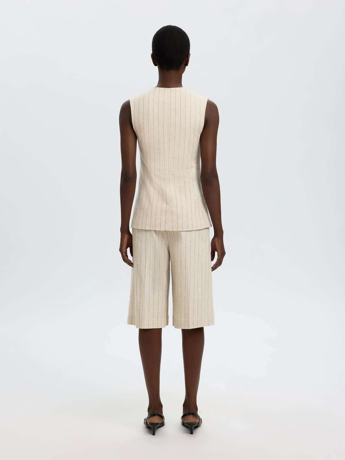 Slffitted Vilka Vest