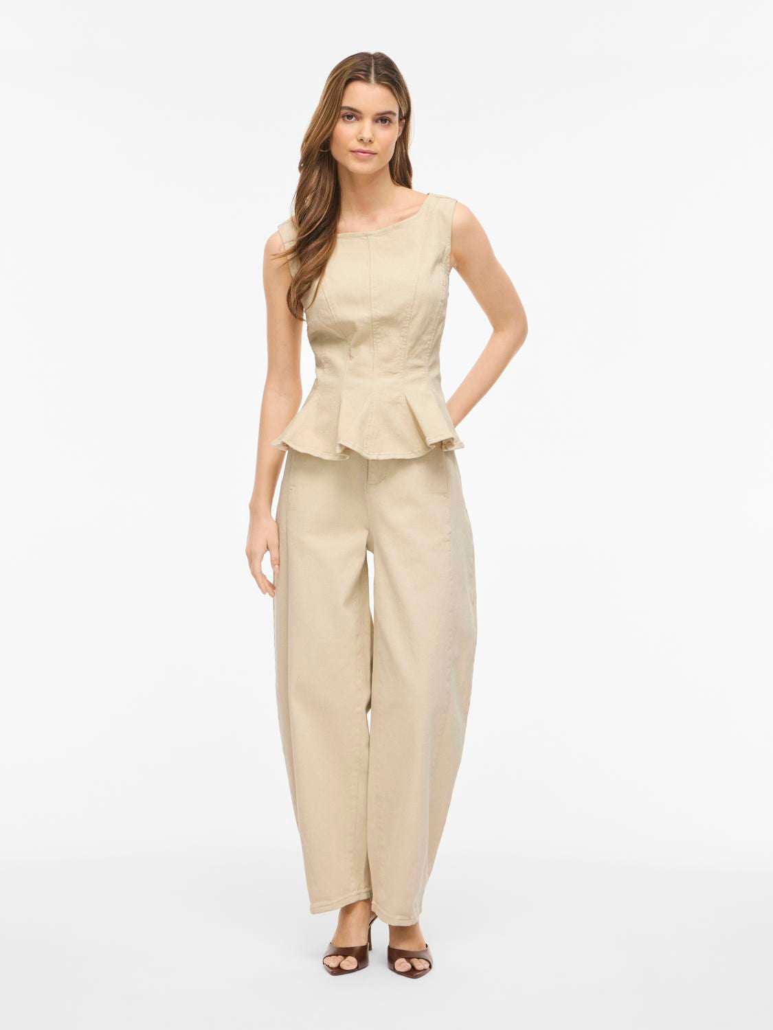 Vichia Peplum Top